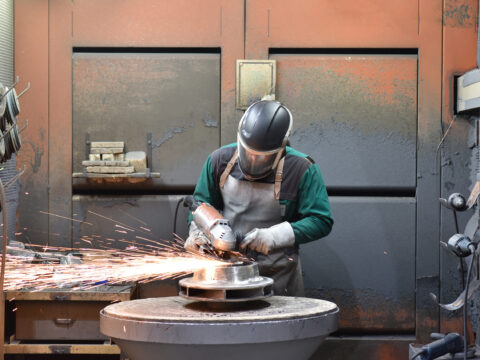 Worker,Machined,Workpiece,Casting,With,A,Grinding,Machine,-,Work Worker,Machined,Workpiece,Casting,With,A,Grinding,Machine,-,Work